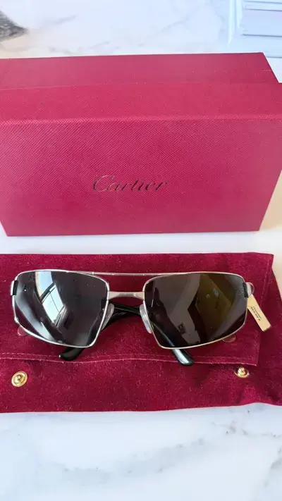 Gafas Cartier Gafas metálicas doradas
